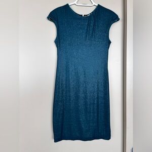 Teal blue sequins mini dress.